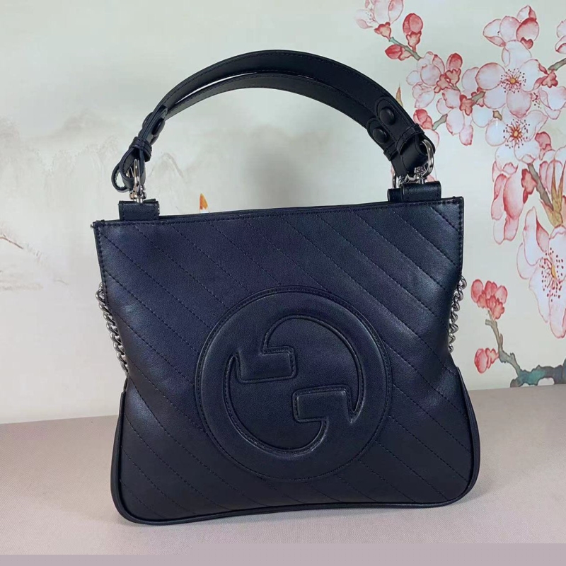 G*u*i top handle bags